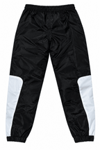 Vista trasera de los joggers reflectivos CHOMPITER con puños elásticos
